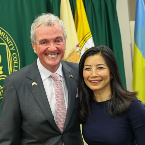 Gov Phil Murphy of New Jersey and tracy Palandjian stand together, smiling.